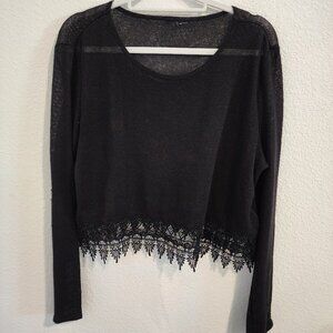 Women's thin knit long sleeve black shirt size XL.  Item 08222419BL